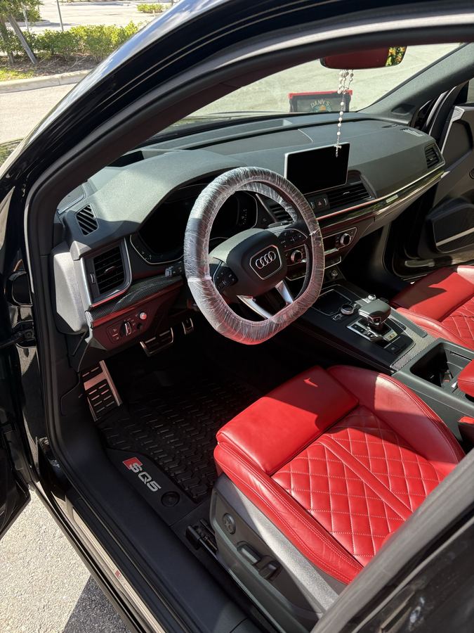 Audi SQ5 interior — red diamond-stitched leather, full detail