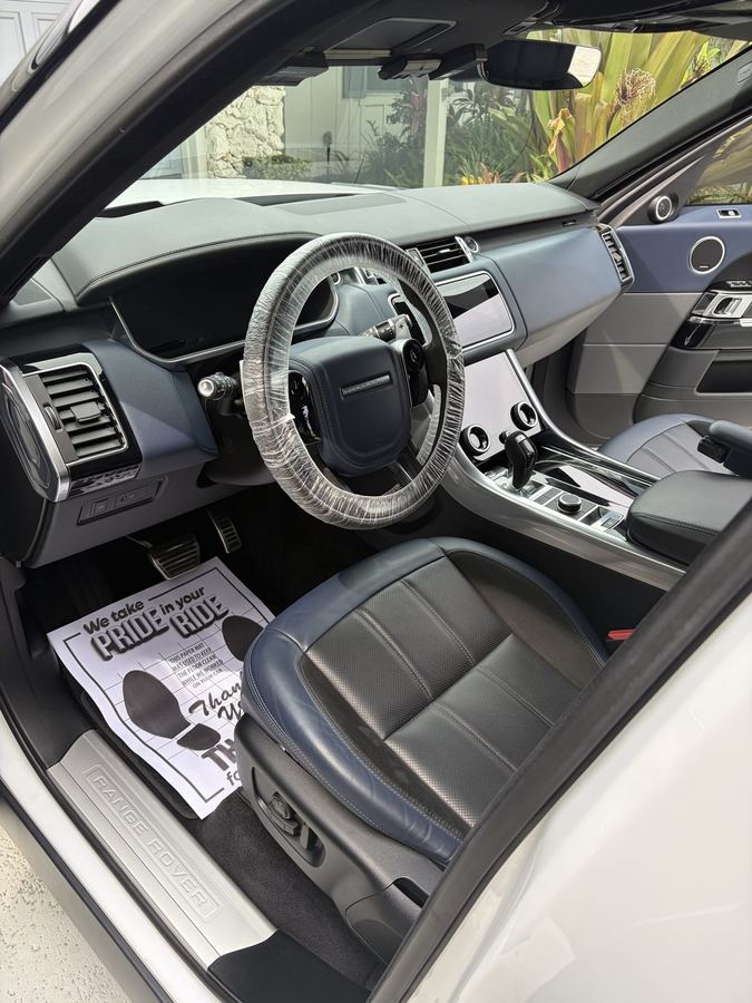 Range Rover Sport interior detailed, blue and black leather